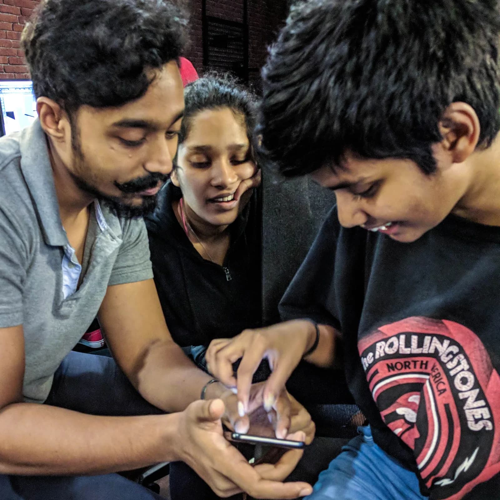 A close view of the team discussing a project
