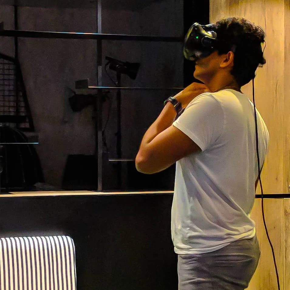 A team member trying a virtual reality headset