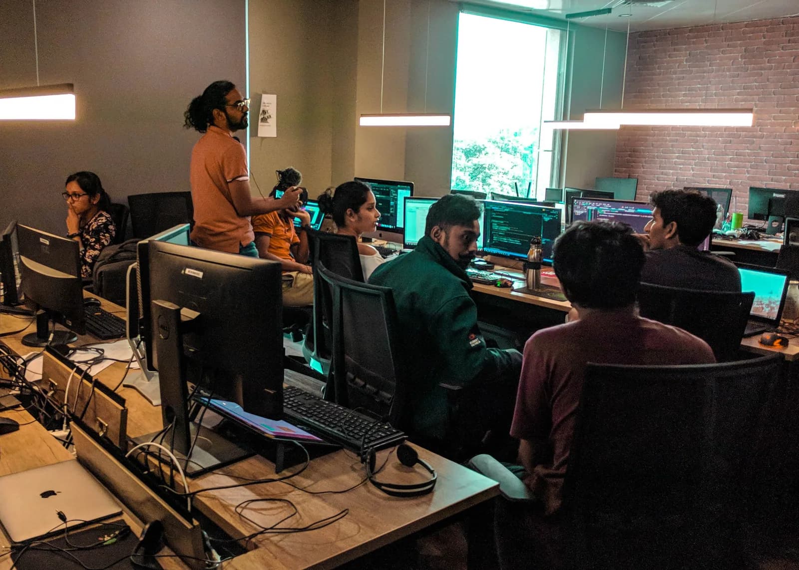 The team at work around the studio desks